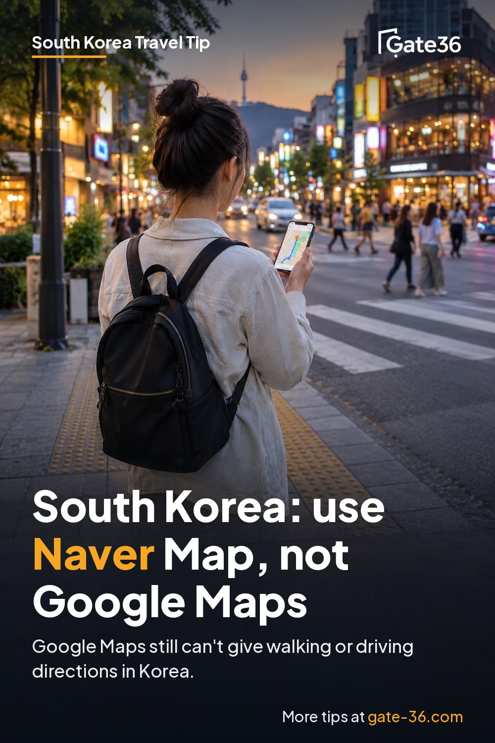 A traveler checks a route on a smartphone map at a busy Seoul street corner in the early evening.
